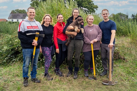 A group of volunteers with tools